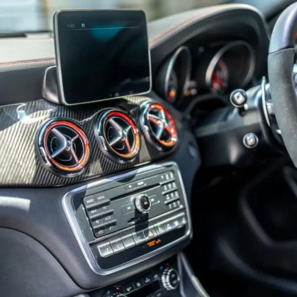 Car dashboard and steering wheel, the area where an ignition interlock device is mounted within the driver's reach.